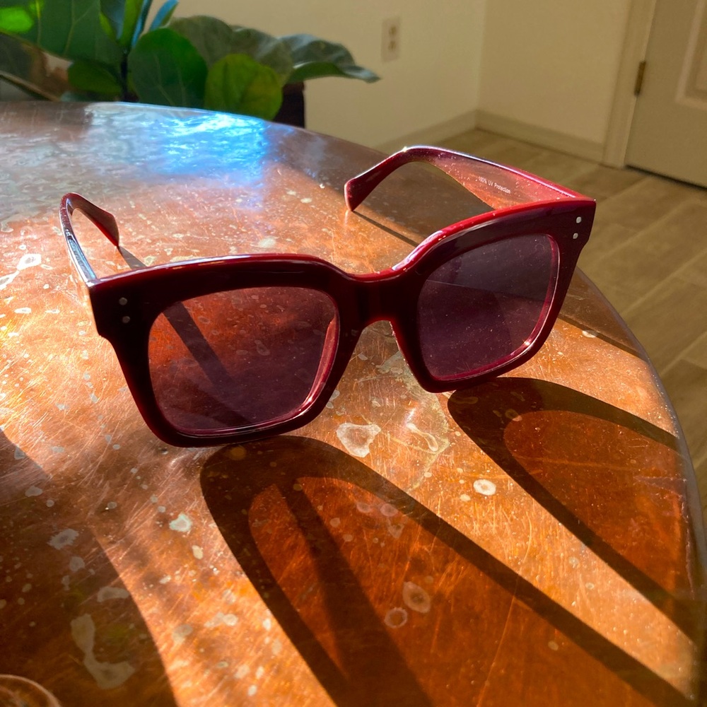 large rim maroon sunglasses
